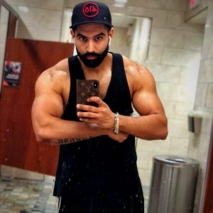 Parmish Verma showing Body and Smile Big Biceps